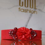 Piros virágos gumis öv